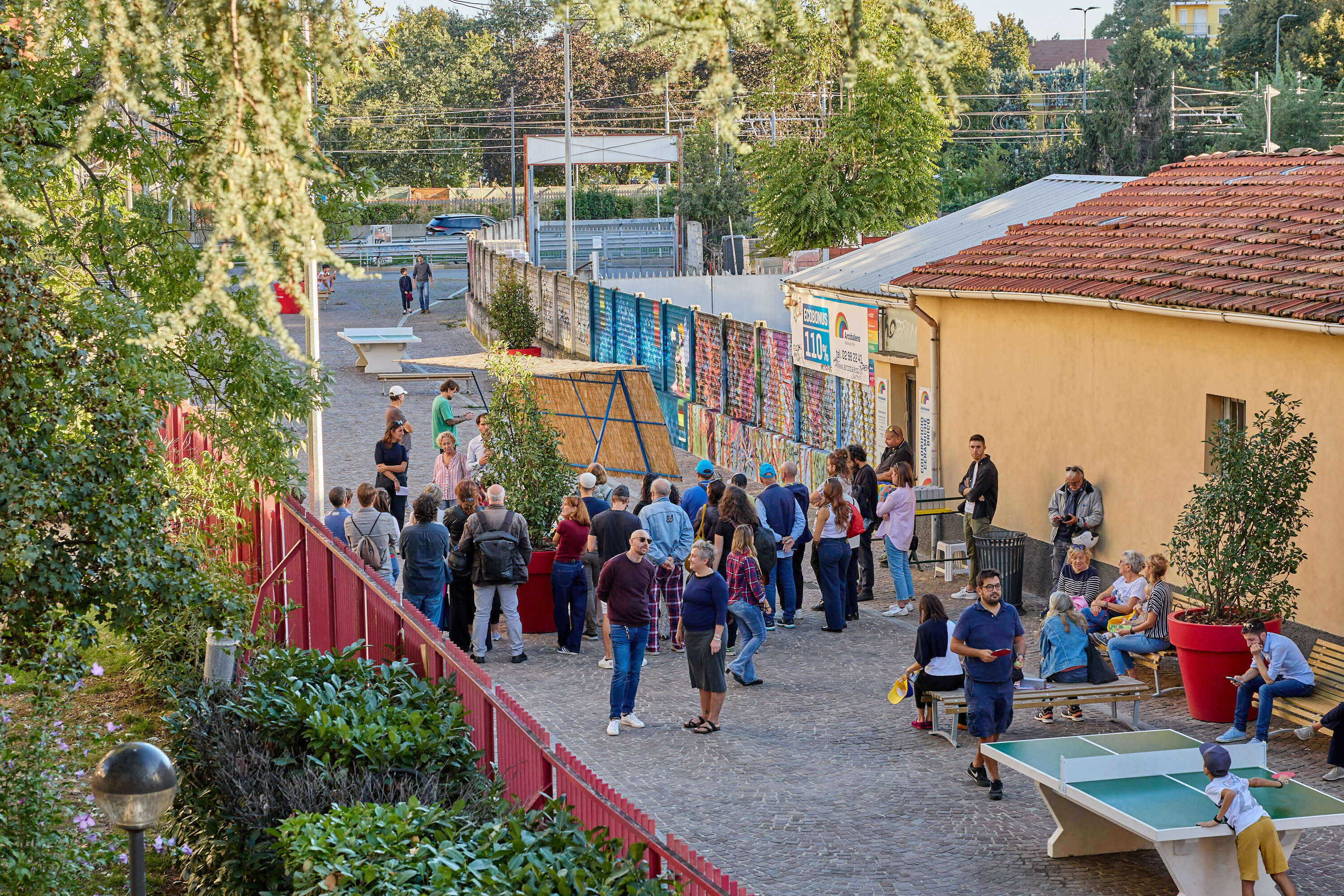 Photo of people walking down a street